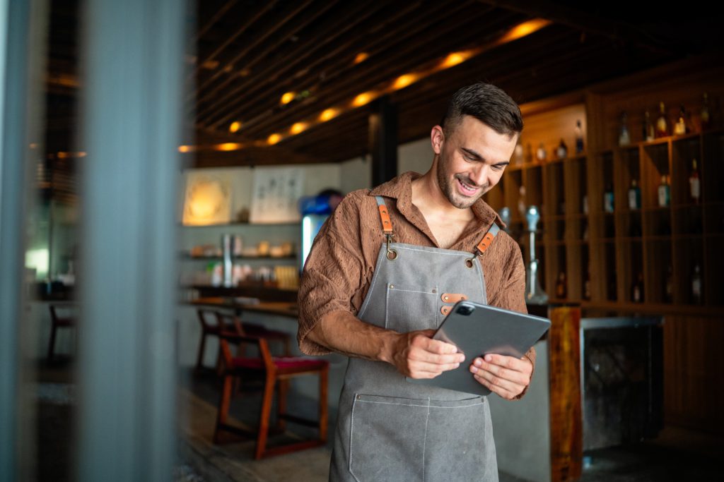 Restaurant owner using digital tools to scale a global food franchise brand